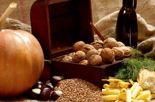Still life with chest, nuts, pumpkin, bread and pasta