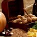 Still life with chest, nuts, pumpkin, bread and pasta